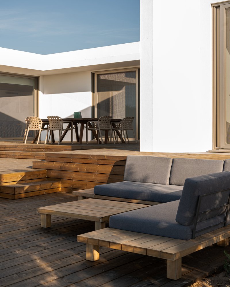 Relax corner with cushions in deck in modern villa terrace